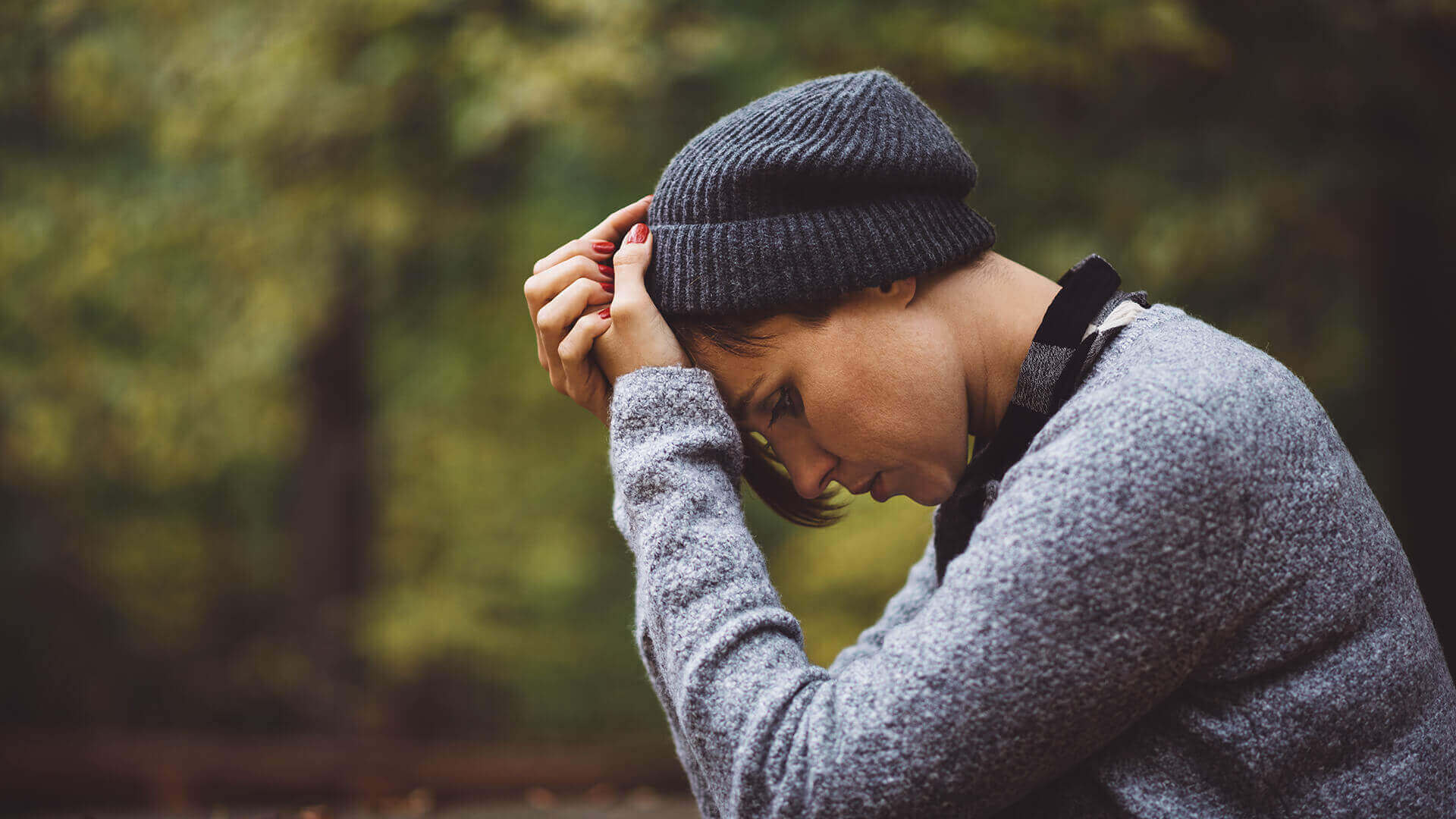 Feeling exhausted, helpless and lack motivation? 3 Exhausted woman holding her head in hands