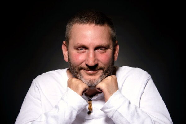 Steven Webb leaning on fists