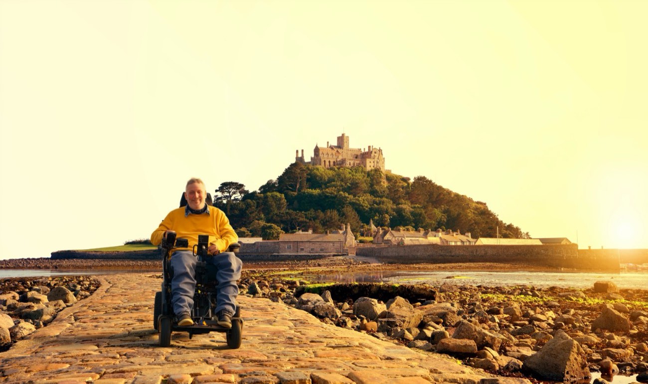 Steven in his wheelchair on the causeway to St Michael's Mount